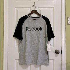 BNWT Reebok shirt with contrast raglan sleeves